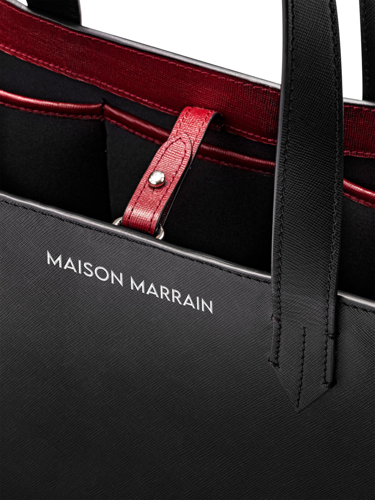 Detail of Maison Marrain logo DeuxVin leather Bag in black 