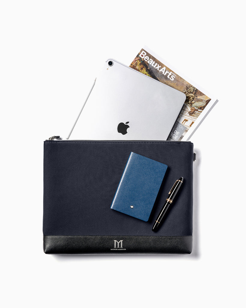 Front of Maison Marrain deuxvie large black pouch for laptop or documents made from neoprene with durable leather trim in black with ipad magazine and pen