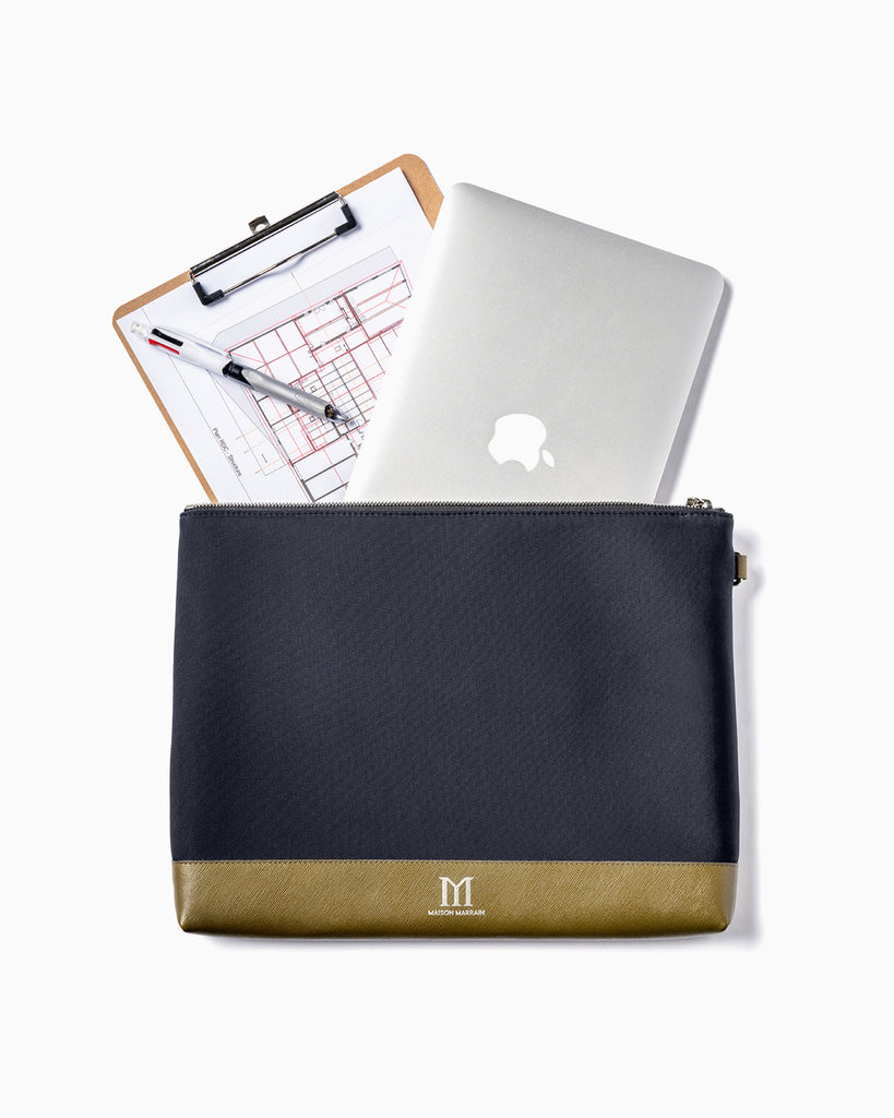 Front of Maison Marrain deuxvie large black pouch for laptop or documents made from neoprene with durable leather trim in vine green with Ipad and pen